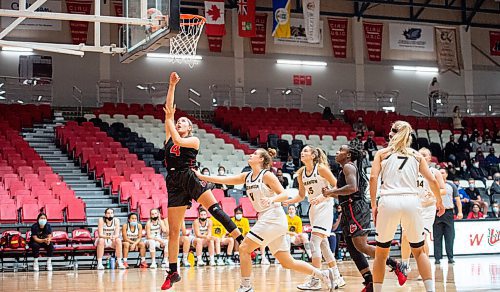 MIKE SUDOMA / Winnipeg Free Press
Wesmen Forward, Keylyn Filewich, scores a lay up as their team takes on the Brandon University Bobcats Friday afternoon at the Duckworth Centre
October 8, 2021