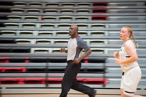 MIKE SUDOMA / Winnipeg Free Press
Longtime referee and former Brandon University Bobcat Basketball player, Earl Roverts, runs up and down the court, following game play as the University Wesmen take on the Brandond University Bobcats Friday afternoon
October 8, 2021