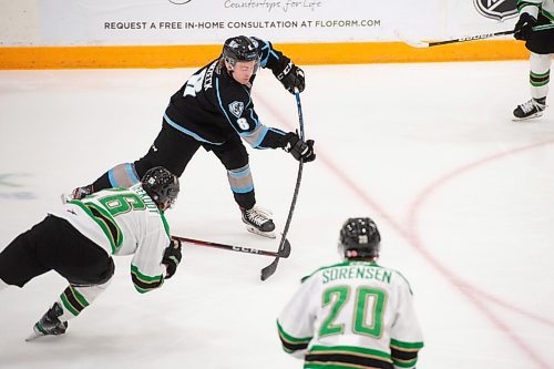 MIKE SUDOMA / Winnipeg Free Press
Winnipeg Ice defence, Nolan Orzeck, moves the puck past the redline as the Ice take on the Prince Albert Raiders Saturday night at Wayne Fleming Arena
October 8, 2021