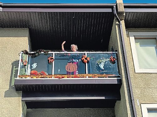 Canstar Community News Ruth MacIsaac, a resident of Concordia Village, is hoping to spark a little joy among other residents and visitors with her balcony decorations. (SHELDON BIRNIE/CANSTAR/THE HERALD)