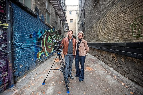 MIKAELA MACKENZIE / WINNIPEG FREE PRESS

Filmmaker Ivan Hughes and producer (and wife) Angela Heck pose for a portrait near their Exchange District office in Winnipeg on Friday, Oct. 8, 2021. They are creating a niche shooting classical musicians, and are currently creating a four-show series on the Manitoba Chamber Orchestra. For Holly Harris story.
Winnipeg Free Press 2021.