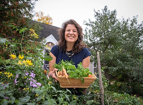 JESSICA LEE / WINNIPEG FREE PRESS

Getty Stewart, a local chef, poses for a photo on October 8, 2021, in her front yard where she keeps a garden of produce which she then cooks in her meals.




