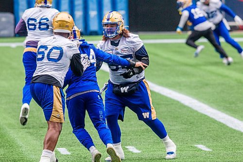 MIKAELA MACKENZIE / WINNIPEG FREE PRESS

Defensive lineman Tui Eli (65) at Bombers practice at IG Field in Winnipeg on Wednesday, Oct. 13, 2021. For Taylor Allen story.
Winnipeg Free Press 2021.