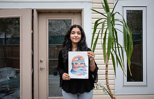JESSICA LEE / WINNIPEG FREE PRESS

Faiza Malik, 16, poses for a photo on October 13, 2021 at her home with her painting titled Just a piece of cloth.

Reporter: Sabrina




