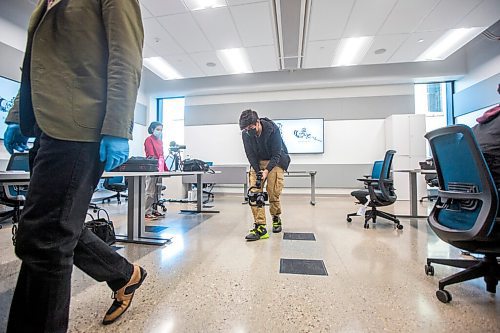 MIKAELA MACKENZIE / WINNIPEG FREE PRESS

Adarsh Gohil tries out his gimbal in the Digital Film and Media Production program freelance video class at RRC Polytechs new Innovation Centre in Winnipeg on Monday, Oct. 18, 2021. This program is the first to be learning in the new space. For Josh Frey-Sam story.
Winnipeg Free Press 2021.