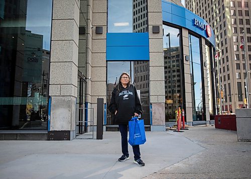 JESSICA LEE / WINNIPEG FREE PRESS

Vivian Ketchum, an indigenous woman, has been repeatedly removed from the BMO bank at Portage and Main, the same company that arrested an Indigenous family in BC last year. She is photographed on October 18, 2021 holding a bag and a piece of candy they gave her afterwards. She says she did not receive an apology for the incidents. She wears the same outfit she wore the day she was kicked out of the bank - her late sons hoodie.

Reporter: Malak






