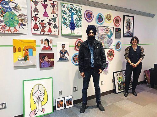 Canstar Community News Prabhbjot Singh Lotey, a Winnipeg-based photojournalist and Lindsay MacKenzie, CBC Manitoba community engagement producer are pictured in the Our Culture. Our Art studio in Garden City Shopping Centre.