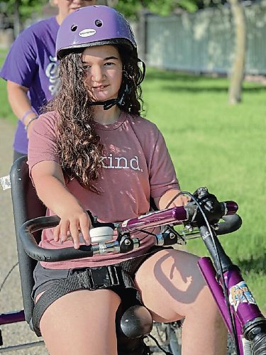 Canstar Community News Oct. 13, 2021 - Ema Guimond was first diagnosed with Rett syndrome in 2013. Guimond uses a tablet and eye gazing device to communicate with her family and those around her. (SUPPLIED PHOTO)