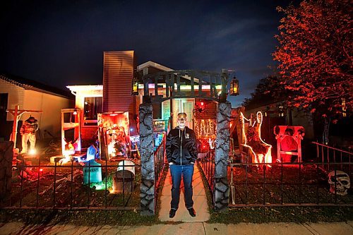 JOHN WOODS / WINNIPEG FREE PRESS
Andrew Royal works on his halloween display at his home in Winnipeg Tuesday, October 19, 2021. Royal raises money for Siloam Mission.

Reporter: Piche