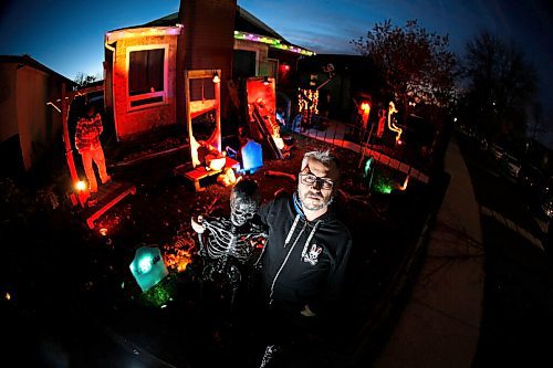 JOHN WOODS / WINNIPEG FREE PRESS
Andrew Royal works on his halloween display at his home in Winnipeg Tuesday, October 19, 2021. Royal raises money for Siloam Mission.

Reporter: Piche