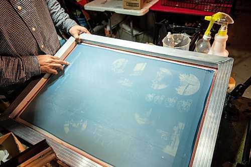MIKE SUDOMA / Winnipeg Free Press
Roy Liang, owner of Winnipeg North of Fargo shows off one of his screen printing screens Tuesday evening
October 20, 2021