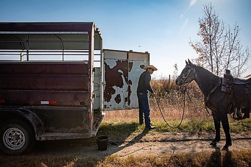 JESSICA LEE / WINNIPEG FREE PRESS

Chris Tacan of the Sioux Valley Dakota Nation Unity Riders leads his horse Prince during a pit stop during the annual Kidney Walk and Ride on October 10, 2021. 

Reporter: Melissa
