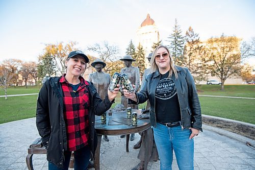 MIKE SUDOMA / Winnipeg Free Press
(Right to Left) Kyla Dumanski from Torque Brewing cheerses the new Whoa Nellie beer with Erica Campbell, Founder of the Society of Beer Drinking Ladies on the Manitoba Legislative grounds Wednesday
October 20, 2021