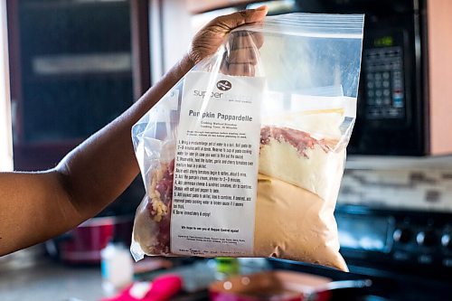 MIKAELA MACKENZIE / WINNIPEG FREE PRESS

Anucyia Kitching prepares a pumpkin pappardelle meal kit in her kitchen in Portage la Prairie on Wednesday, Oct. 20, 2021. For Anucyia Kitching story.
Winnipeg Free Press 2021.