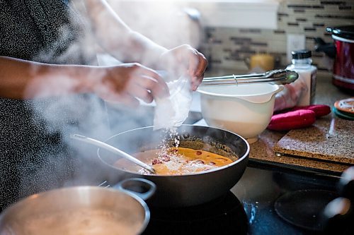 MIKAELA MACKENZIE / WINNIPEG FREE PRESS

Anucyia Kitching prepares a pumpkin pappardelle meal kit in her kitchen in Portage la Prairie on Wednesday, Oct. 20, 2021. For Anucyia Kitching story.
Winnipeg Free Press 2021.