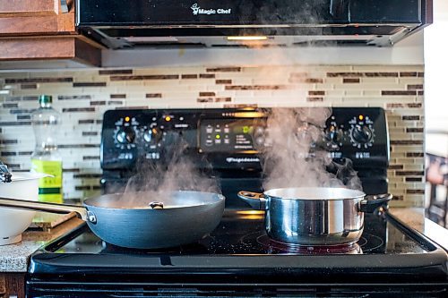 MIKAELA MACKENZIE / WINNIPEG FREE PRESS

Anucyia Kitching prepares a pumpkin pappardelle meal kit in her kitchen in Portage la Prairie on Wednesday, Oct. 20, 2021. For Anucyia Kitching story.
Winnipeg Free Press 2021.