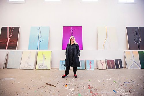 MIKAELA MACKENZIE / WINNIPEG FREE PRESS

Wanda Koop poses for a portrait among new works (inspired by the dead poplars around her cabin, where she created the paintings) in her studio in Winnipeg on Thursday, Oct. 21, 2021. For Al Small story.
Winnipeg Free Press 2021.