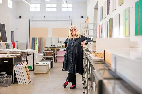 MIKAELA MACKENZIE / WINNIPEG FREE PRESS

Wanda Koop poses for a portrait among new works (inspired by the dead poplars around her cabin, where she created the paintings) in her studio in Winnipeg on Thursday, Oct. 21, 2021. For Al Small story.
Winnipeg Free Press 2021.