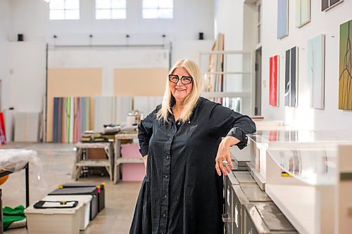 MIKAELA MACKENZIE / WINNIPEG FREE PRESS

Wanda Koop poses for a portrait among new works (inspired by the dead poplars around her cabin, where she created the paintings) in her studio in Winnipeg on Thursday, Oct. 21, 2021. For Al Small story.
Winnipeg Free Press 2021.