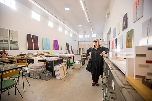 MIKAELA MACKENZIE / WINNIPEG FREE PRESS

Wanda Koop poses for a portrait among new works (inspired by the dead poplars around her cabin, where she created the paintings) in her studio in Winnipeg on Thursday, Oct. 21, 2021. For Al Small story.
Winnipeg Free Press 2021.