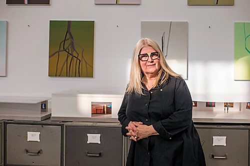 MIKAELA MACKENZIE / WINNIPEG FREE PRESS

Wanda Koop poses for a portrait among new works (inspired by the dead poplars around her cabin, where she created the paintings) in her studio in Winnipeg on Thursday, Oct. 21, 2021. For Al Small story.
Winnipeg Free Press 2021.