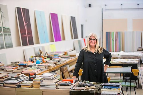 MIKAELA MACKENZIE / WINNIPEG FREE PRESS

Wanda Koop poses for a portrait among new works (inspired by the dead poplars around her cabin, where she created the paintings) in her studio in Winnipeg on Thursday, Oct. 21, 2021. For Al Small story.
Winnipeg Free Press 2021.