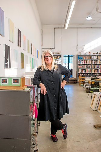 MIKAELA MACKENZIE / WINNIPEG FREE PRESS

Wanda Koop poses for a portrait among new works (inspired by the dead poplars around her cabin, where she created the paintings) in her studio in Winnipeg on Thursday, Oct. 21, 2021. For Al Small story.
Winnipeg Free Press 2021.