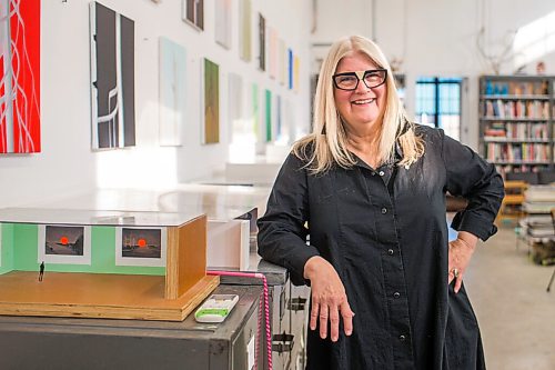 MIKAELA MACKENZIE / WINNIPEG FREE PRESS

Wanda Koop poses for a portrait among new works (inspired by the dead poplars around her cabin, where she created the paintings) in her studio in Winnipeg on Thursday, Oct. 21, 2021. For Al Small story.
Winnipeg Free Press 2021.