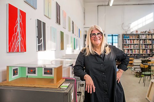 MIKAELA MACKENZIE / WINNIPEG FREE PRESS

Wanda Koop poses for a portrait among new works (inspired by the dead poplars around her cabin, where she created the paintings) in her studio in Winnipeg on Thursday, Oct. 21, 2021. For Al Small story.
Winnipeg Free Press 2021.