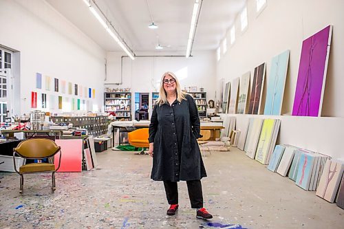 MIKAELA MACKENZIE / WINNIPEG FREE PRESS

Wanda Koop poses for a portrait among new works (inspired by the dead poplars around her cabin, where she created the paintings) in her studio in Winnipeg on Thursday, Oct. 21, 2021. For Al Small story.
Winnipeg Free Press 2021.