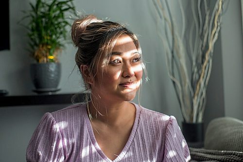 MIKAELA MACKENZIE / WINNIPEG FREE PRESS

Jaynee Medrano, who contracted COVID-19 and was diagnosed with breast cancer within months of each other, poses for a portrait in her home while recovering from surgery in Winnipeg on Thursday, Oct. 21, 2021. For Malak story.
Winnipeg Free Press 2021.