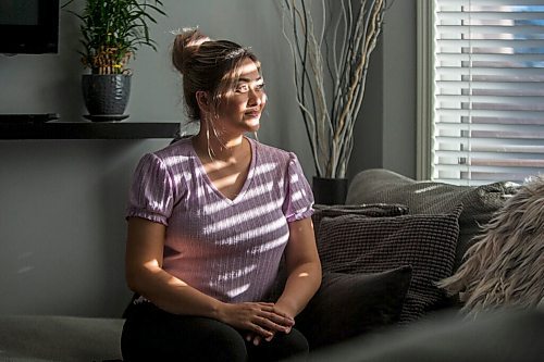 MIKAELA MACKENZIE / WINNIPEG FREE PRESS

Jaynee Medrano, who contracted COVID-19 and was diagnosed with breast cancer within months of each other, poses for a portrait in her home while recovering from surgery in Winnipeg on Thursday, Oct. 21, 2021. For Malak story.
Winnipeg Free Press 2021.