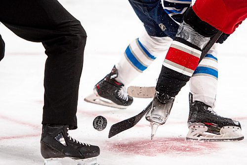 MIKE SUDOMA / Winnipeg Free Press
Grand Rapids Griffins win a second period face off as they play the Manitoba Moose Friday night at Canada Life Place October 22, 2021