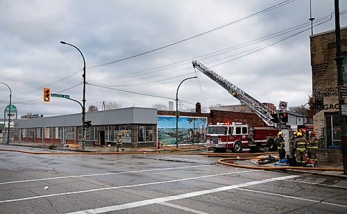 JOHN WOODS / WINNIPEG FREE PRESS
Firefighters work a fire scene at a building in the 800 block of Main Street Sunday, October 24, 2021

Reporter: Standup