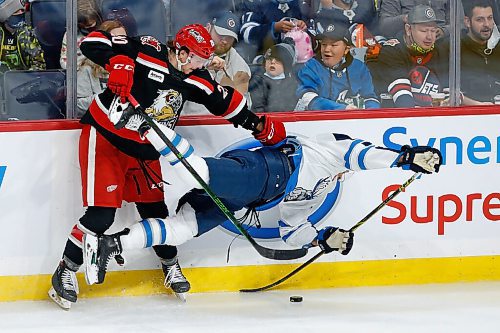 JOHN WOODS / WINNIPEG FREE PRESS
Manitoba Moose C.J. Suess (25) gets checked by Grand Rapids Griffins Dan Renouf during second period AHL action in Winnipeg on Sunday, October 24, 2021.

Reporter: Sawatzky