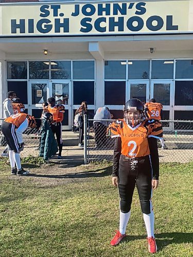 Canstar Community News Makayla Anderson, 17, gears up for a Thursday evening game.