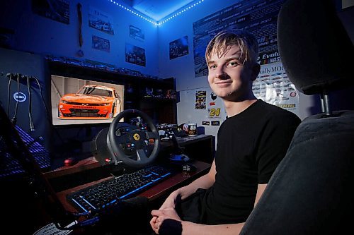 JOHN WOODS / WINNIPEG FREE PRESS
Carter Friesen, 16, is photographed in his bedroom with his computer system and the Nascar car he designed Tuesday, October 26, 2021 in Winnipeg. Friesen has impressed some executives involved with Nascar and has been invited to take in a race and meet the execs this weekend.

Reporter: Taylor