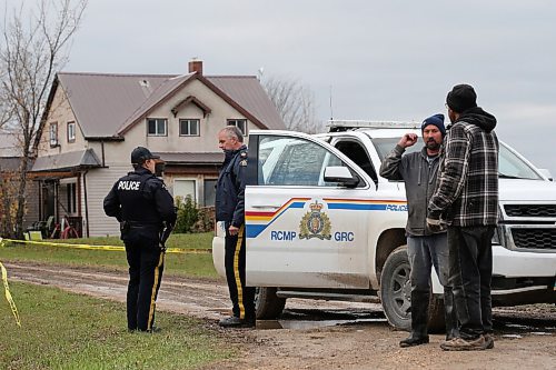 SHANNON VANRAES/WINNIPEG FREE PRESS
RCMP vehicles park in front of a home near the community of New Bothwell, where a 73-year-old woman was found deceased, on October 28, 2021.