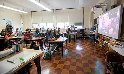 MIKE DEAL / WINNIPEG FREE PRESS
Technical-Vocational High School students in Dave Harack's grade 10 humanities class watch a live-streamed celebration of the the Winnipeg School Division (WSD) 150 year Friday morning. The event took place in the Technical-Vocational High School Theatre and was streamed to several locations Friday morning. 
See Maggie Macintosh story
211029 - Friday, October 29, 2021.