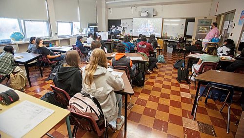 MIKE DEAL / WINNIPEG FREE PRESS
Technical-Vocational High School students in Dave Harack's grade 10 humanities class watch a live-streamed celebration of the the Winnipeg School Division (WSD) 150 year Friday morning. The event took place in the Technical-Vocational High School Theatre and was streamed to several locations Friday morning. 
See Maggie Macintosh story
211029 - Friday, October 29, 2021.