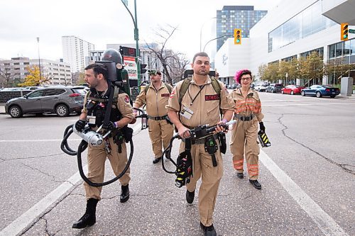Mike Sudoma / Winnipeg Free Press
The Winnipeg Ghostbusters take a break from their booth at Comic Con and walk down York Avenue Saturday afternoon
October 30, 2021