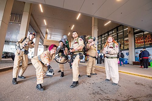 Mike Sudoma / Winnipeg Free Press
The Winnipeg Ghostbusters  take a break from their booth at Comic Con Saturday afternoon
October 30, 2021