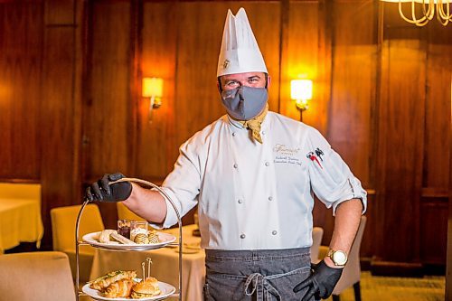 MIKAELA MACKENZIE / WINNIPEG FREE PRESS

Richard Duncan, executive sous chef at the Fairmont, poses for a portrait with the Winnie-the-Pooh themed high tea, which is part of the hotel's 50-year anniversary celebrations, in Winnipeg on Thursday, Nov. 4, 2021. For Eva Wasney story.
Winnipeg Free Press 2021.