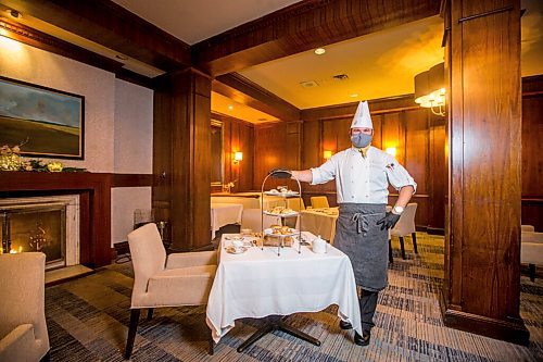 MIKAELA MACKENZIE / WINNIPEG FREE PRESS

Richard Duncan, executive sous chef at the Fairmont, poses for a portrait with the Winnie-the-Pooh themed high tea, which is part of the hotel's 50-year anniversary celebrations, in Winnipeg on Thursday, Nov. 4, 2021. For Eva Wasney story.
Winnipeg Free Press 2021.