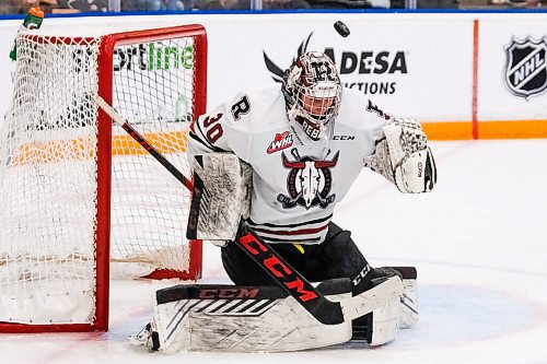 Daniel Crump / Winnipeg Free Press. Red Deer goalie Chase Coward (30) makes a save with his head. The Winnipeg Ice take on the Red Deer Rebels at the Wayne Fleming Arena in Winnipeg. November 4, 2021.