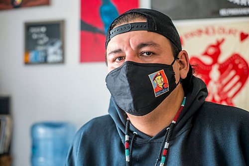 MIKAELA MACKENZIE / WINNIPEG FREE PRESS

Manny Spence, founder of Helping Hand Warriors, models the Tommy Prince hoodie and mask that they are selling to fundraise for a community kitchen in Winnipeg on Friday, Nov. 5, 2021. For Shelley story.
Winnipeg Free Press 2021.