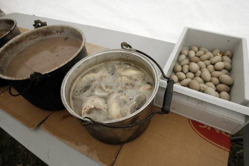 MIKE.DEAL@FREEPRESS.MB.CA 100520 - Thursday, May 20th, 2010 OPASKWAYAK CREE NATION Joe E. Ross School sets up a traditional camp and hosts a community feast. Pots of snapper head soup waiting for the final touches along with the boiled Mud Hen eggs. See Nick Martin story. MIKE DEAL / WINNIPEG FREE PRESS
