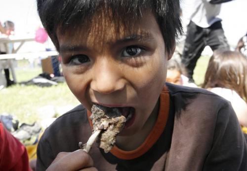 MIKE.DEAL@FREEPRESS.MB.CA 100520 - Thursday, May 20th, 2010 OPASKWAYAK CREE NATION Brandon Bignell, 8, a grade one student at Joe E. Ross School eats the duck that was in his soup during the traditional camp and community feast. See Nick Martin story. MIKE DEAL / WINNIPEG FREE PRESS
