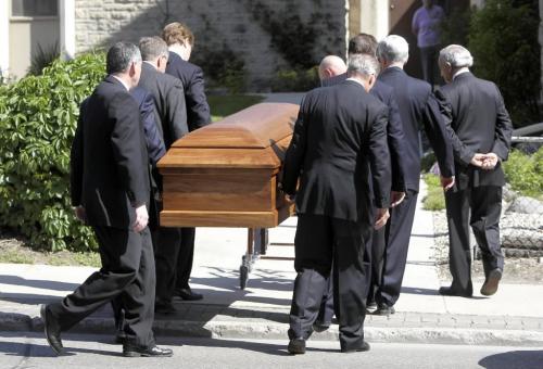 MIKE.DEAL@FREEPRESS.MB.CA 100603 - Thursday, June 3nd, 2010 Duff Roblin's casket is taken into All Saints' Anglican Church on Broadway and Colony Thursday morning. Former premier Duff Roblin died Sunday in hospital after a brief illness. He was 92. MIKE DEAL / WINNIPEG FREE PRESS