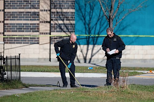 JOHN WOODS / WINNIPEG FREE PRESS
Police investigate at the scene of a homicide at Burrows and Aikens in Winnipeg on Sunday, November 7, 2021. 

Re: Thorpe